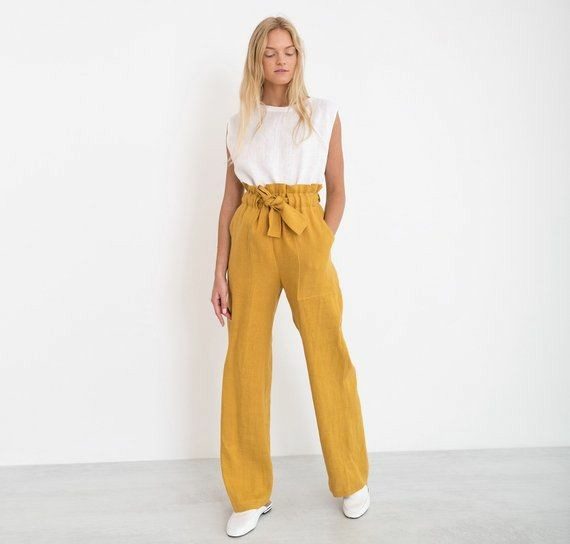 white top yellow pants